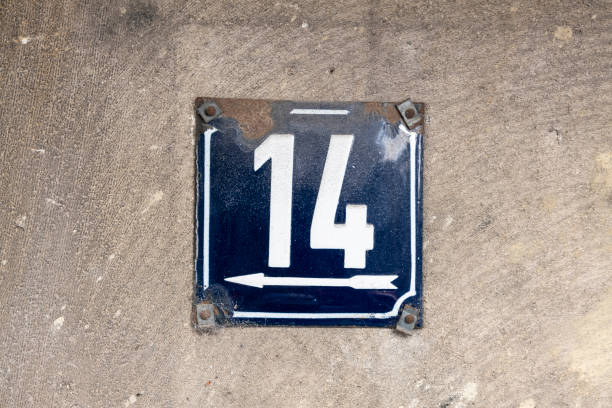 istock Street number sign on the wall 1174473299