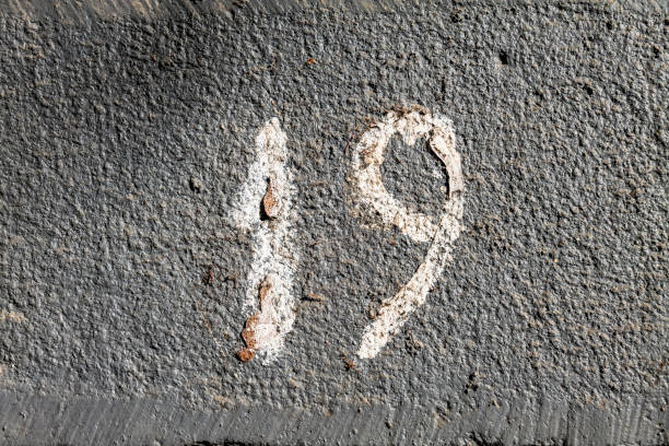 istock Street number sign on the wall 1174473471