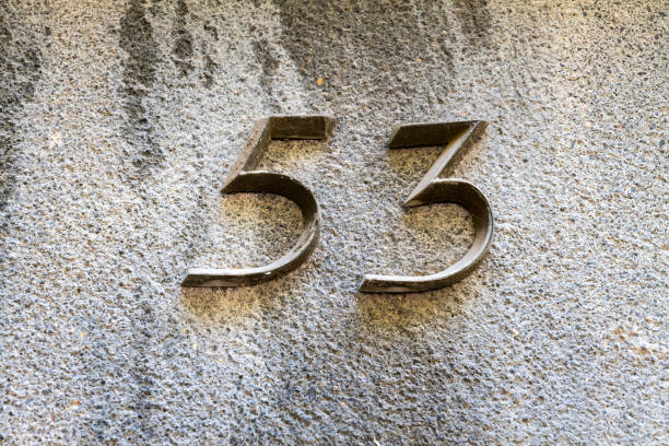 istock Street number sign on the wall 1174473498