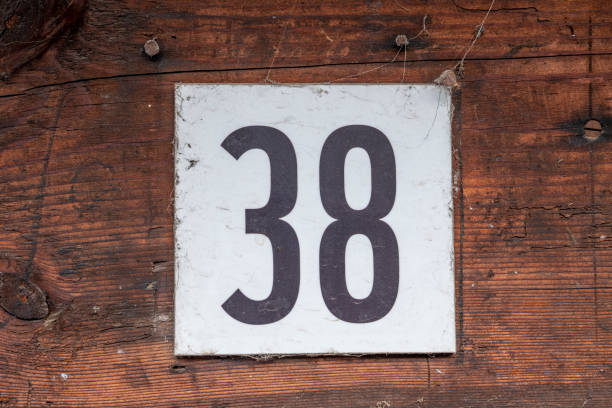 istock Street number sign on the wall 1174473499