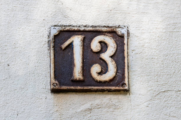 istock Street number sign on the wall 1174473537