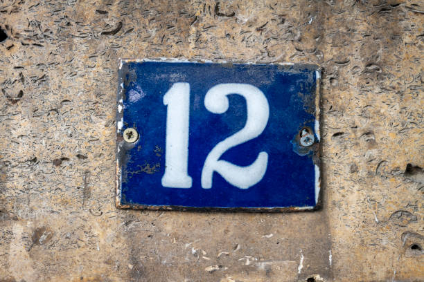 istock Street number sign on the wall 1174473594