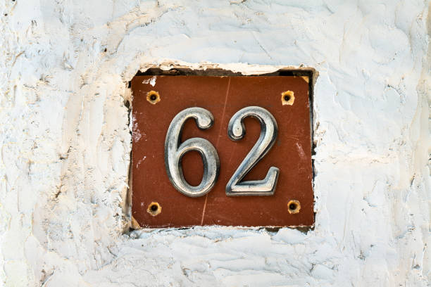 istock Street number sign on the wall 1174473661