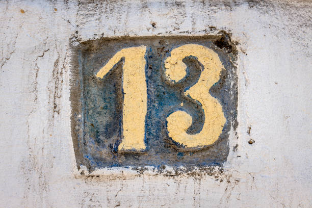 istock Street number sign on the wall 1174473789