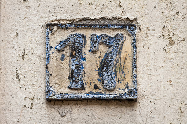 istock Street number sign on the wall 1174474629