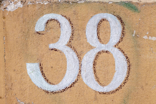 istock Street number sign on the wall 1174474634