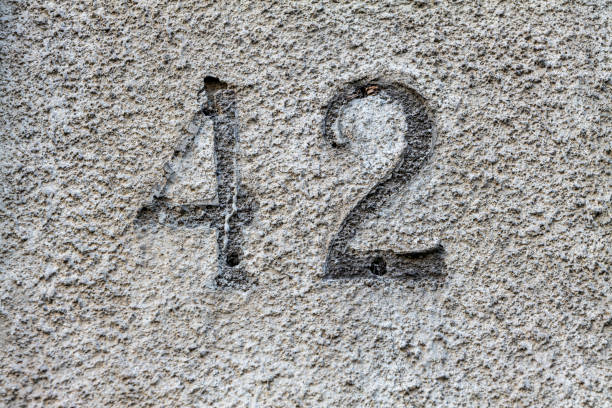 istock Street number sign on the wall 1174474873