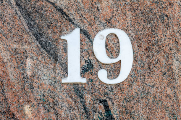 istock Street number sign on the wall 1174475107