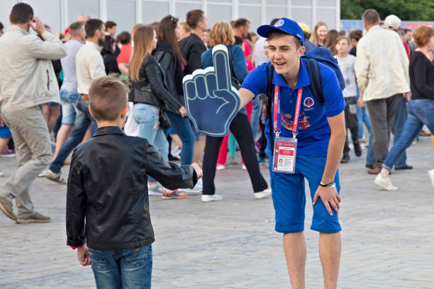 young volunteers in the kaliningrad fifa fan fest zone on the days of  fifa world cup of 2018 in russia. - fifa torneio imagens e fotografias de stock