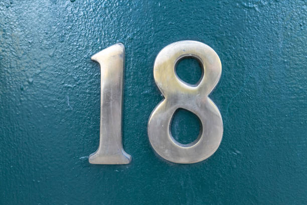 istock Street number sign on the wall 1174475498