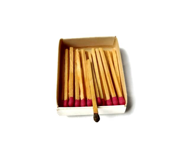 istock pack of burnt matches on white background 1174478025