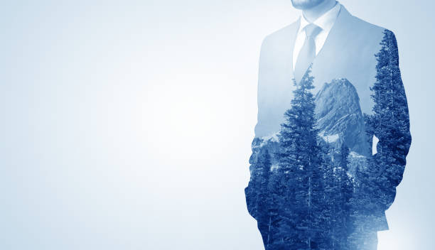 istock Businessman standing with mountain 1174480590