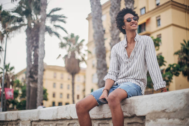 istock Cheerful young man listening to music 1174482018