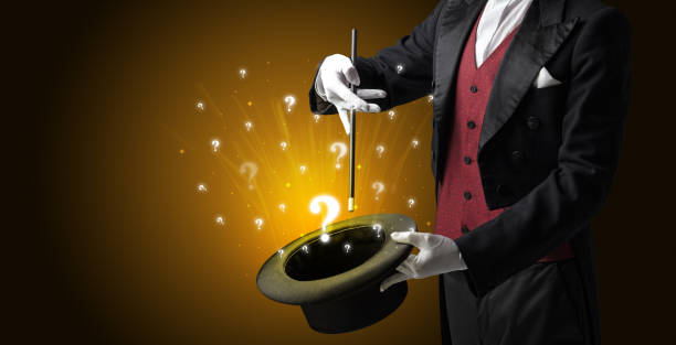 istock Magician conjure question signs from a cylinder 1174482025