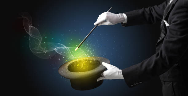 istock Illusionist hand making trick with wand 1174482053