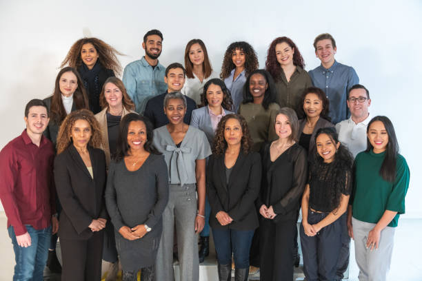 istock Multi-ethnic group of adults posing in studio 1174486781