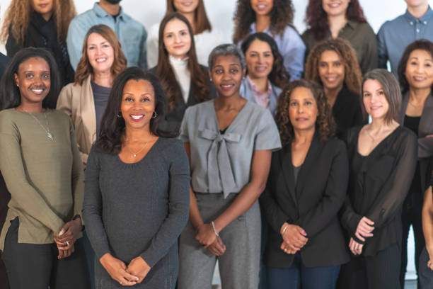 istock Multi-ethnic group of adults posing in studio 1174486799