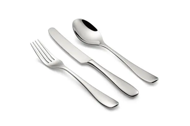 Photo of Silverware set with a knife, a fork and a spoon