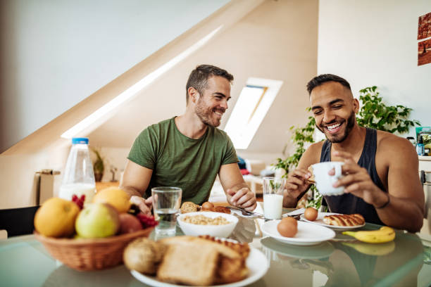 istock Gay couple having healthy breakfast 1174490043