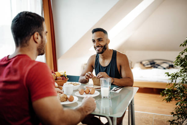 istock LGBT couple having healthy breakfast 1174491893