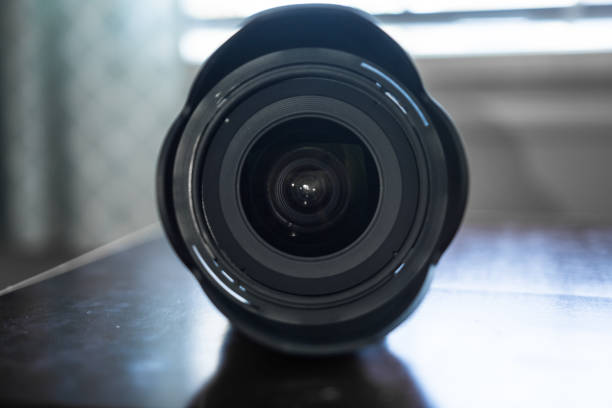 istock Closeup of DSLR lens front element 1174494948