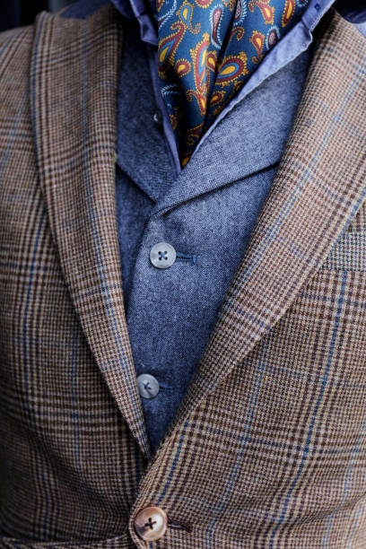 istock Expensive Brown Suit On Hanger Stand 1174495695
