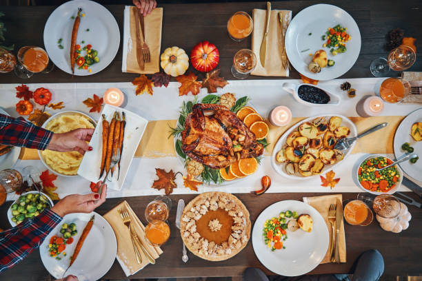 istock Family Having Traditional Holiday Stuffed Turkey Dinner 1174497040