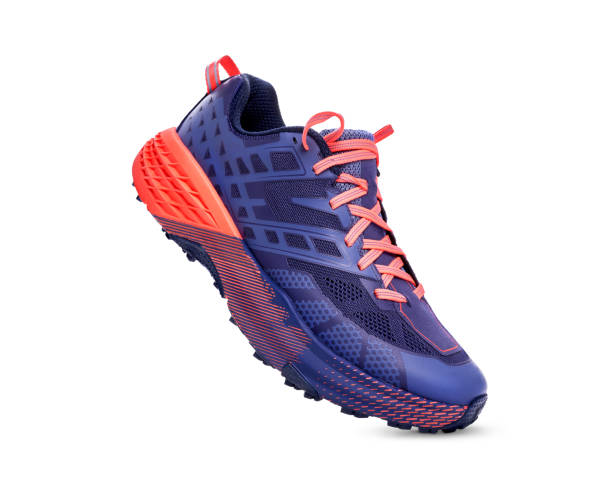 A side view of purple and orange Trainers