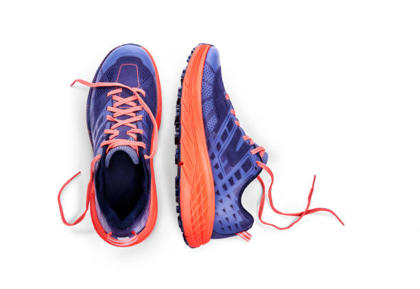 istock A side view of purple and orange Trainers 1174497522