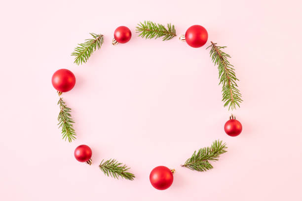 istock Flat lay christmas frame with spruce branches and christmas decorations on a color background 1174498315