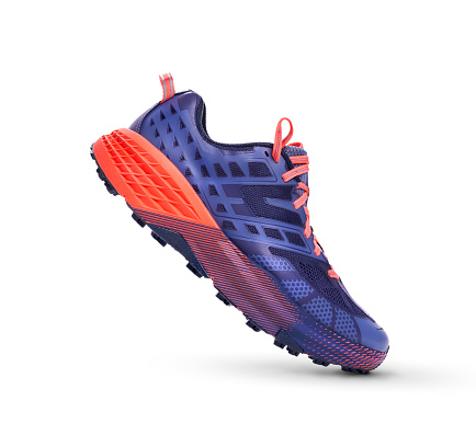 istock A side view of purple and orange Trainers 1174498492