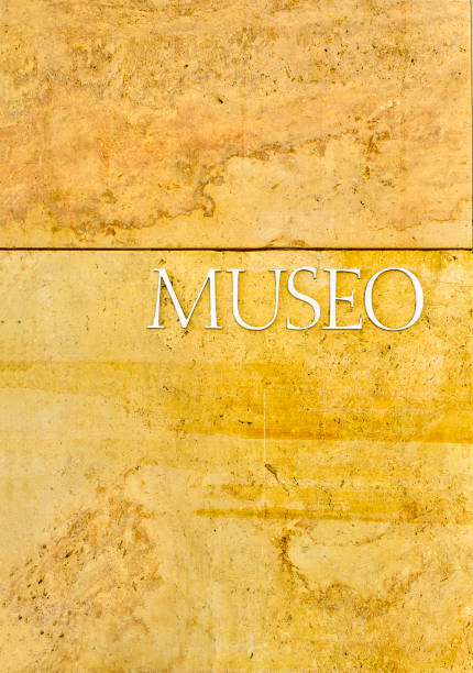 istock Museum signboard in Spanish on a stone wall. 1174499705