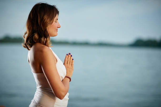 istock Woman practicing yoga in nature. 1174505061