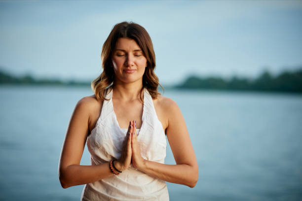 istock Woman practicing yoga in nature. 1174505793