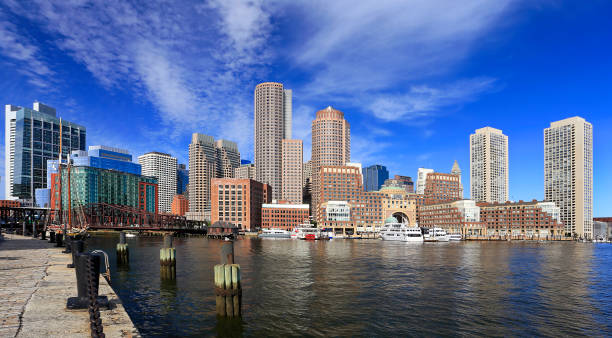 istock Colorful Boston skyline early morning with skyscraper reflections into the ocean 1174508433