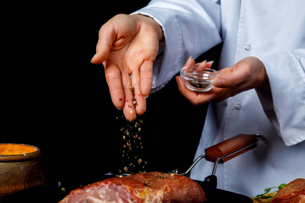 istock Cook sprinkle the meat with seasoning . 1174512127