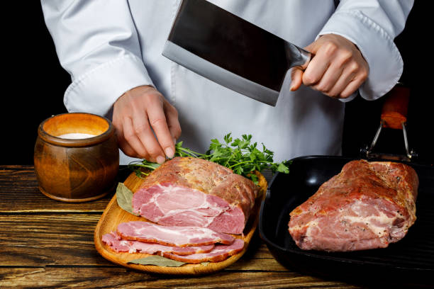 istock The chef is going to slice the ham . 1174512222
