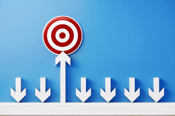 istock White Arrows and a Bulls Eye Target Forming a Bar Graph on Blue background 1174513894