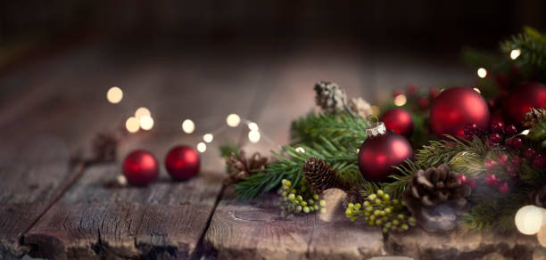 istock Christmas Baubles Old Wood Background 1174514675