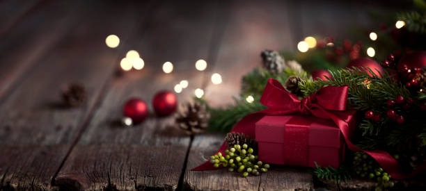 Christmas Gift on Old Wood Background