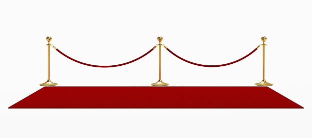 Red carpet isolated on white background. Horizontal composition with clipping path and copy space. Great use for red carpet related concepts.