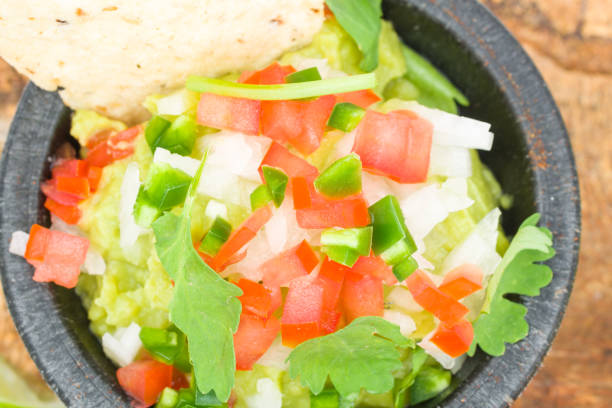 istock Mexican guacamole dish in a typical molcajete 1174514910