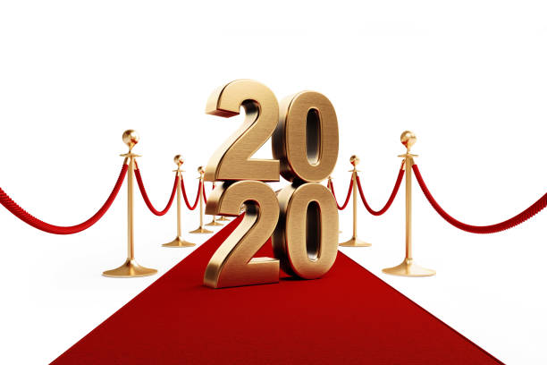 istock Gold Colored 2020 Standing on A Red Carpet - Red Carpet Event Concept 1174517165