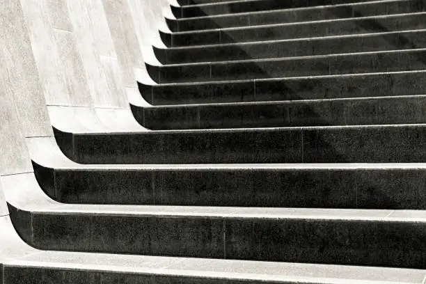 Photo of Conrete steps, black and white, abstract background with copy space