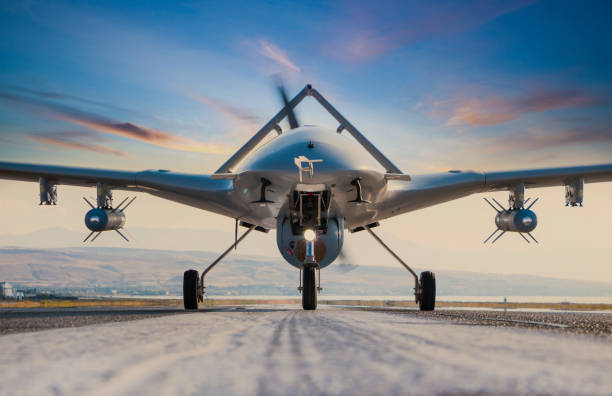 滑走路上の武装無人航空機 - military reconnaissance airplane ストックフォトと画像