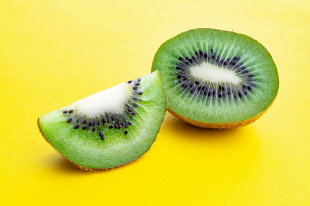 istock Kiwi fruit. Green kiwifruit isolated on white background. 1174519027