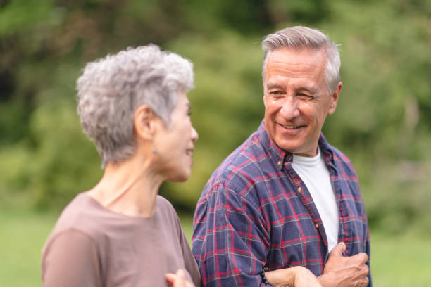 istock Retired couple hiking in forest 1174519030