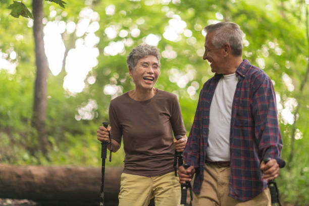 istock Happy senior couple hiking 1174519115