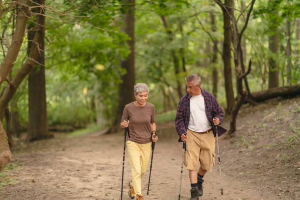 istock Happy senior couple hiking 1174520238