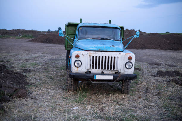 istock Old Russian truck in the field 1174521308